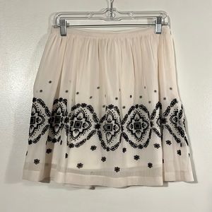 April Chu cream/black chiffon lined back zip circle skirt